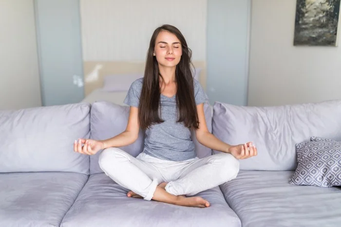 Women doing Sukhasana yoga pose